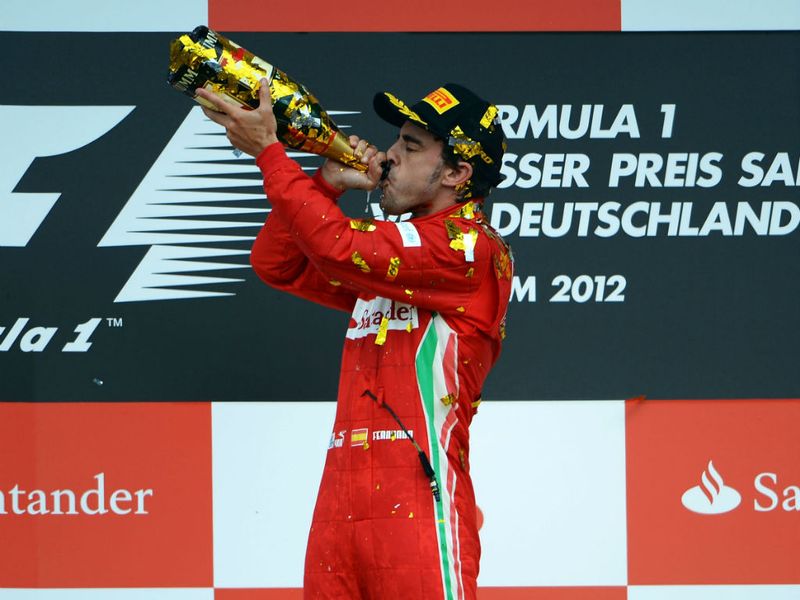Alonso drinks the bubbly