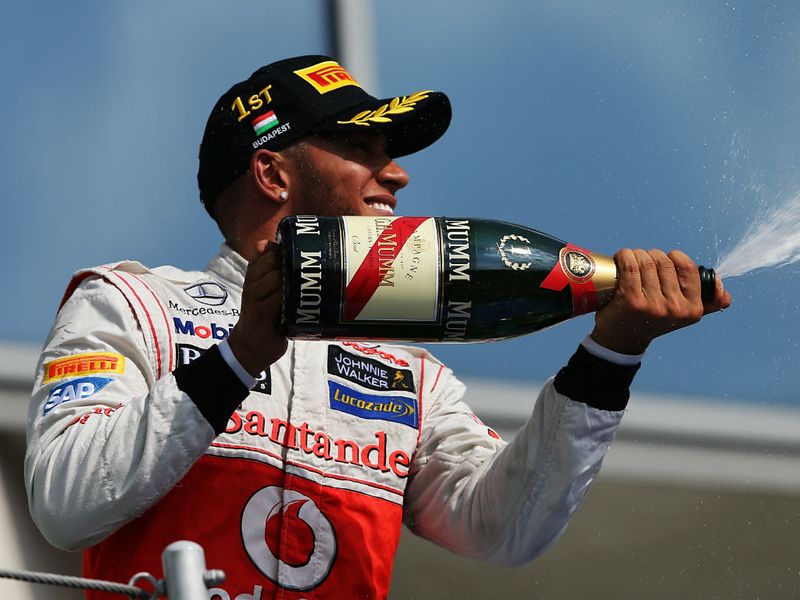 Lewis sprays the champagne