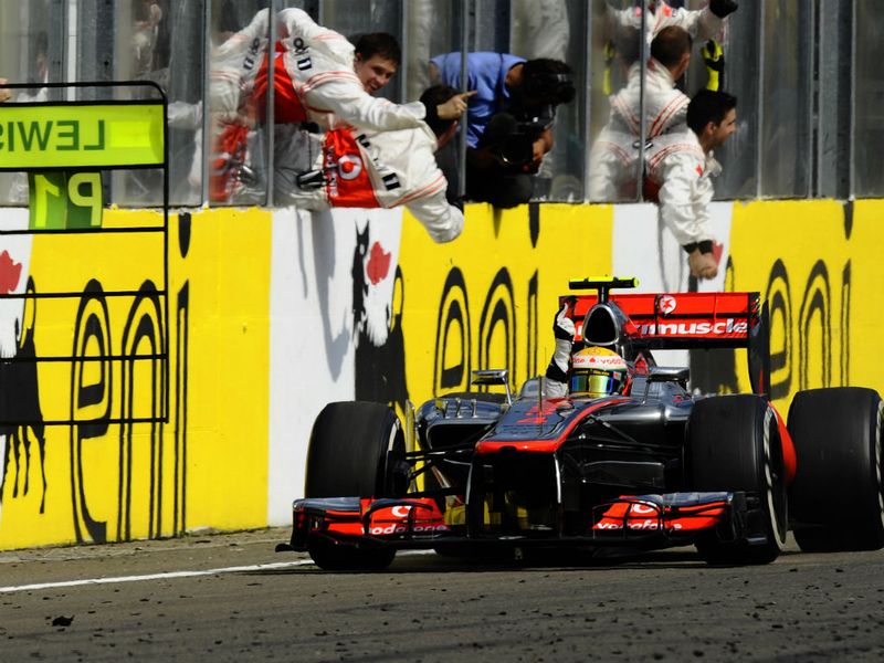 Hamilton crosses the line to win as McLaren celebrate