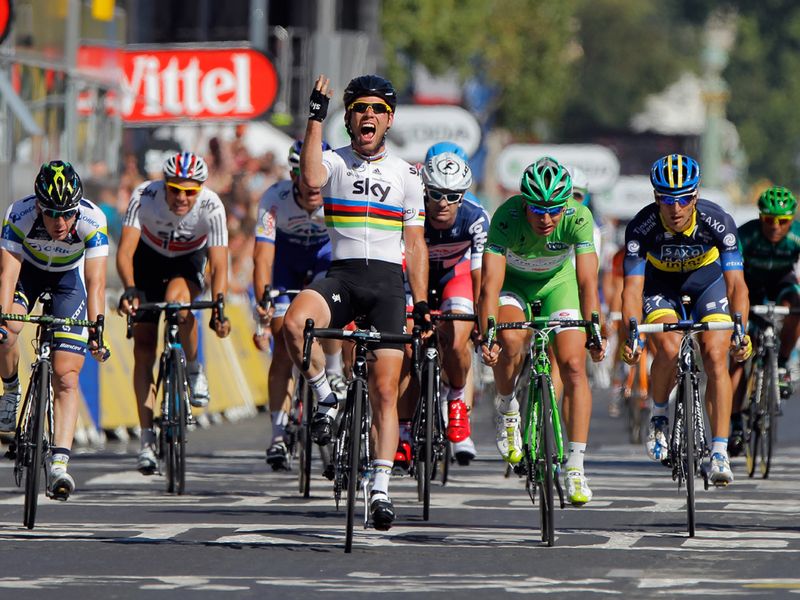 Cavendish went for a long sprint and held on for his fourth straight win on the Champs-Elysees