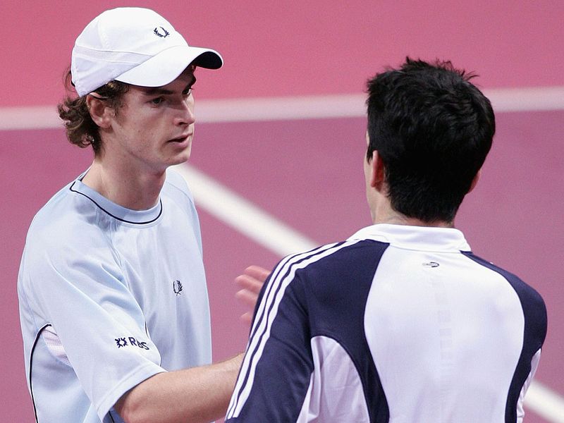 Changing of the guard: In his last tournament of 2005, Murray faced British no. 1 Tim Henman and beat him in three sets.