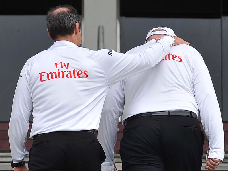 The umpires took one last look before calling the day a washout.