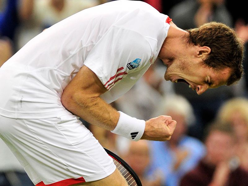 Andy Murray enjoys his victory over Marcos Baghdatis in the third round of Wimbledon 2012.