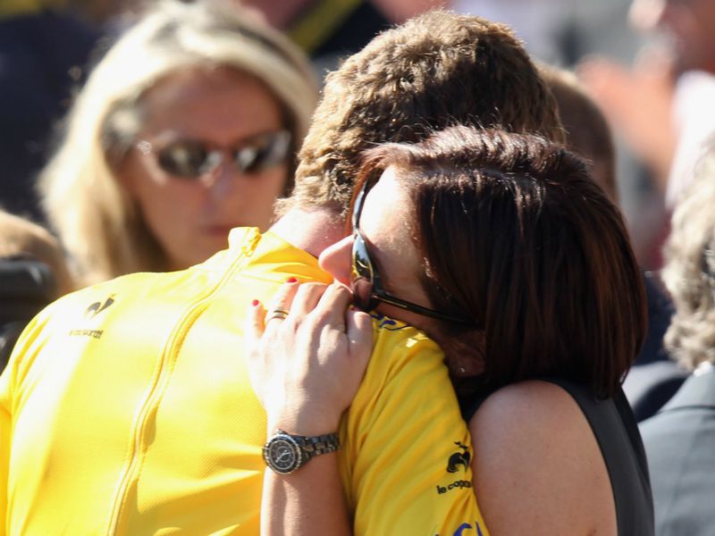 Wiggins is embraced by his wife Cath