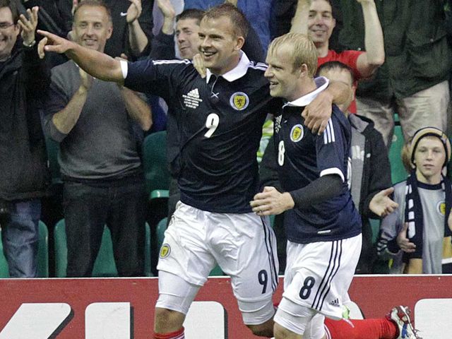 Jordan Rhodes celebrates his goal for Scotland