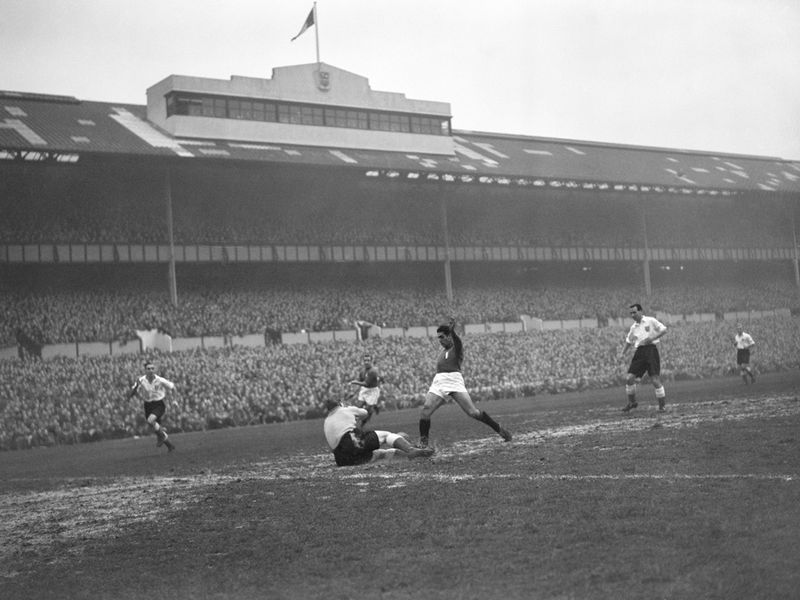 England goalkeeper Bert Williams makes a save during an international against Italy at White Hart Lane in 1949