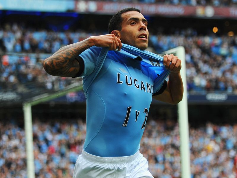 Tevez celebrates the first goal of Man City's season