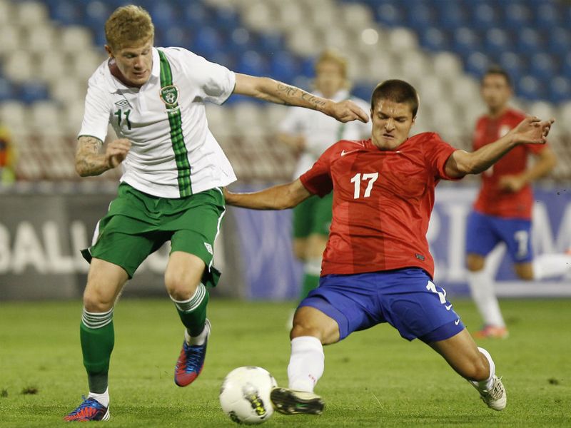 Republic of Ireland's James McClean is challenged by Aleksandar Ignjovski of Serbia in a goalless ecnounter at the Marakana Stadium in Belgrade.
