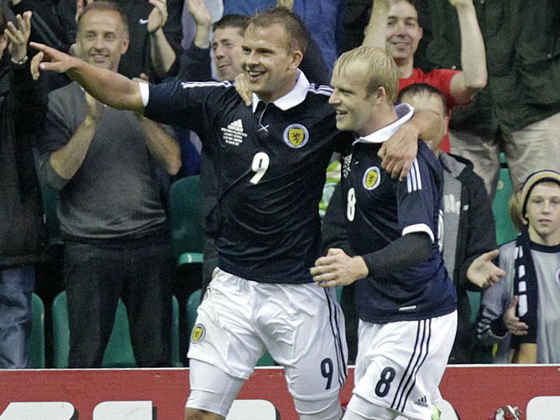 Jordan Rhodes celebrates scoring with Steven Naismith as Scotland defeat Australia 3-1 at Easter Road.