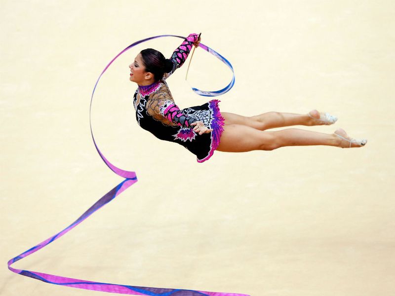 American Julie Zetlin flies during the rythmic gymnastics individual all around competition.