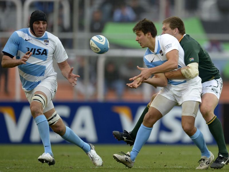Lucas Gonzalez Amorosino offloads in the tackle.