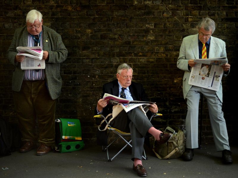 Members of the MCC and other spectators wait in line to get into the ground for the day's play.