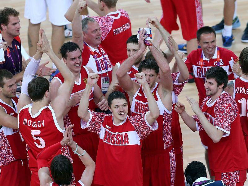 Bronze Ballers: Russian players and coaching staff celebrate winning the men's basketball bronze medal against Argentina