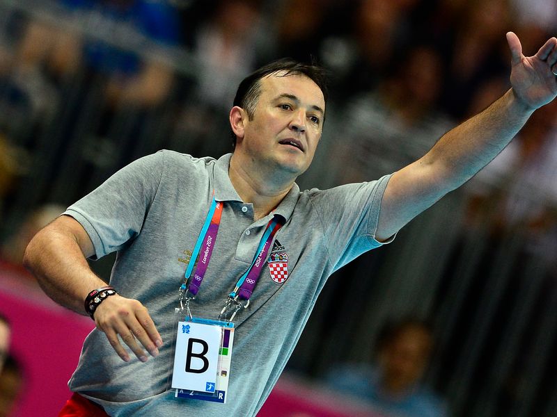 Touchline Tactician: Croatia's coach Slavko Goluza reacts during the men's bronze medal handball match against Hungary which his country win