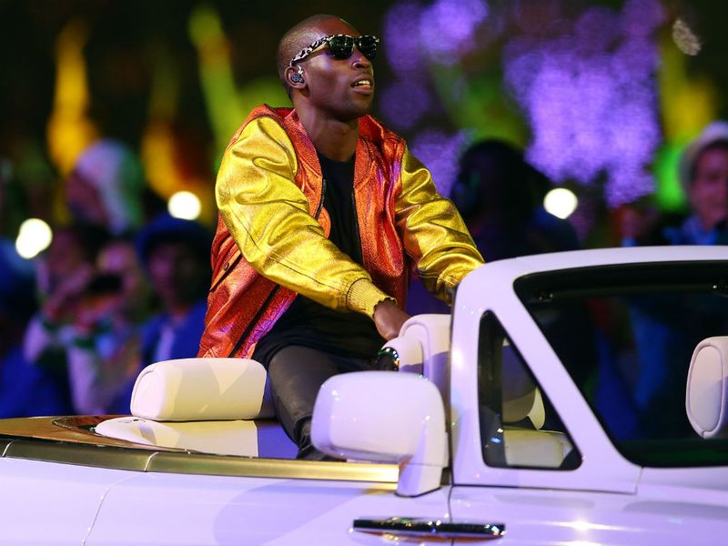 Tinie Tempah joins Jessie J and Taio Cruz on stage to pay tribute to the Bee Gees
