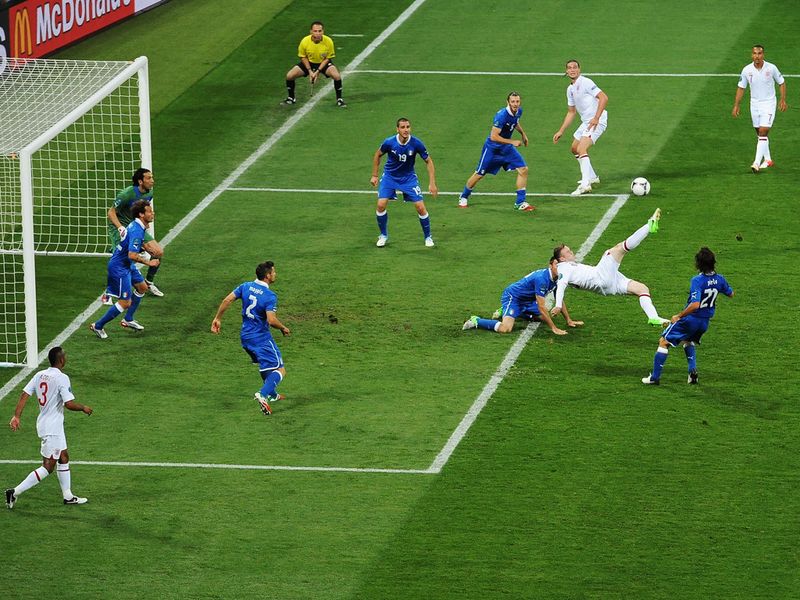 Wayne Rooney went close in extra-time with this overhead kick but Italy deserved their place in the semi-finals, where they defeated Germany