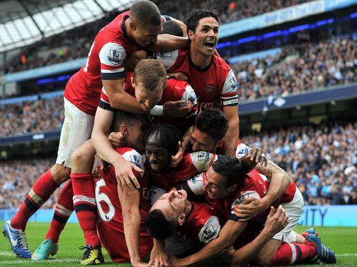 Arsenal celebrate their late leveller