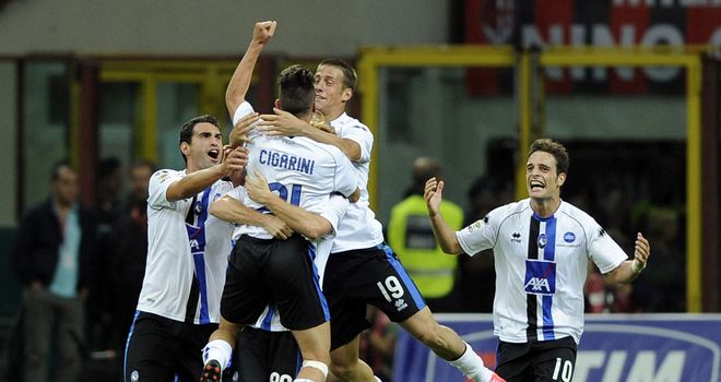 Atalanta celebrate Luca Cigarini's goal