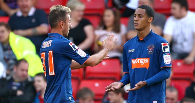 Ince: Celebrates with Angel Martinez