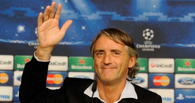 Roberto Mancini: Determined to help Manchester City progress past the group phase