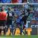 Fulham's Hugo Rodallega scores against his old club Wigan at the DW Stadium