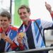 The Brownlee brothers Alistair and Jonathan show off their medals from the triathlon.