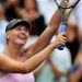 The 2006 champion had to dig deep but she eventually overcame Bartoli 3-6 6-3 6-4.