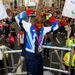 Here's what many travelled to see, double gold medallist Mo Farah doing the 'Mobot'.