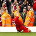 Gerrard points skywards as he celebrates his goal