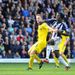 At The Hawthorns, Reading's Alex Pearce and Romelu Lukaku of West Brom battle for the ball