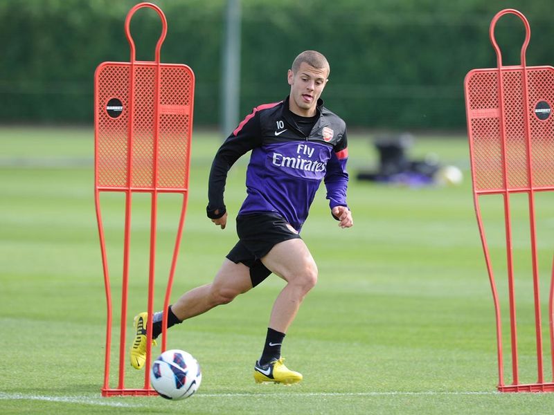 England midfielder Jack Wilshere returned to full training with Arsenal on Thursday after 14 months on the sidelines with ankle and knee injuries