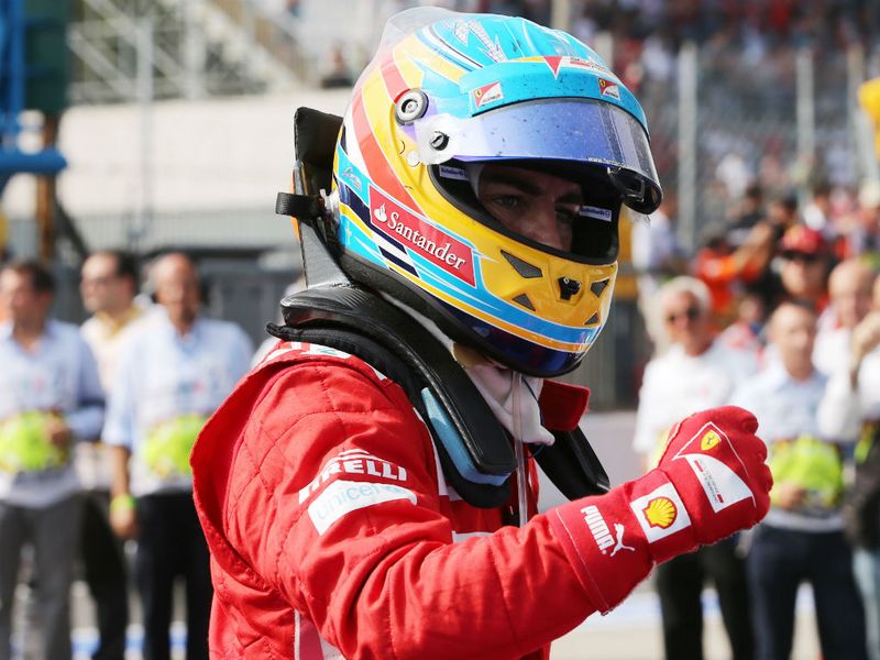 Fernando Alonso celebrates third