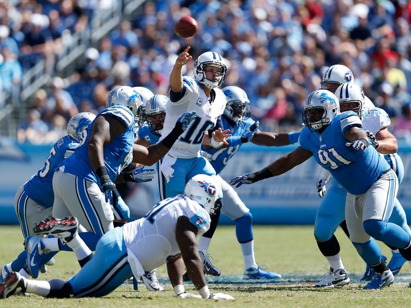 Jake Locker threw for 378 yards as the Titans claimed a wild 44-41 overtime win against the Lions
