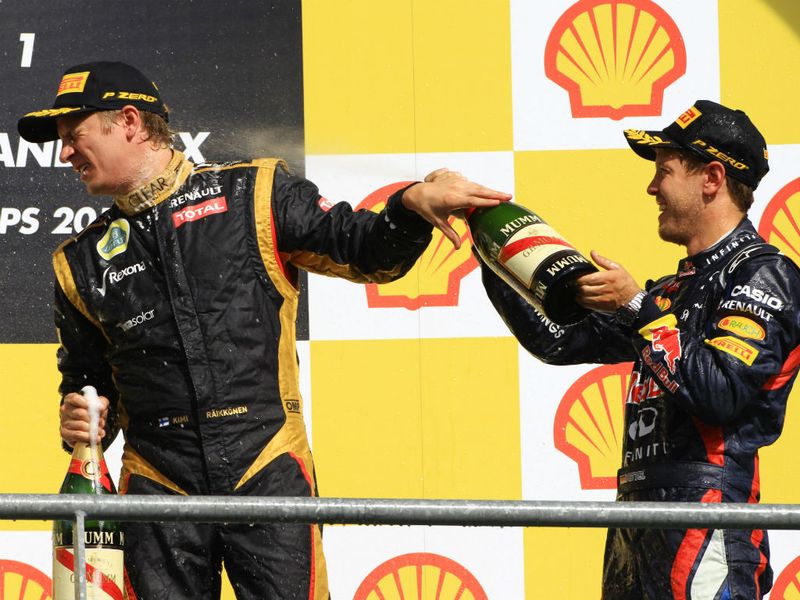 Vettel soaks Raikkonen