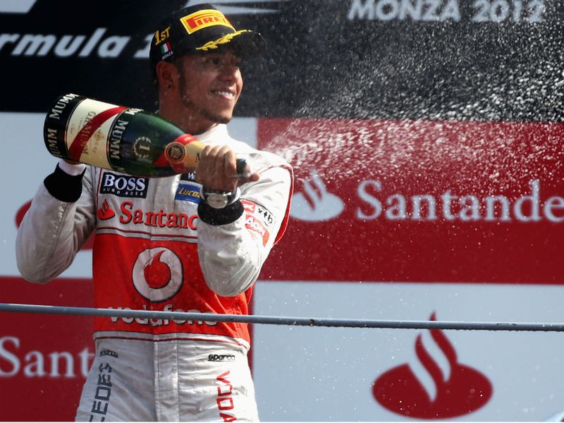Lewis Hamilton sprays the champagne