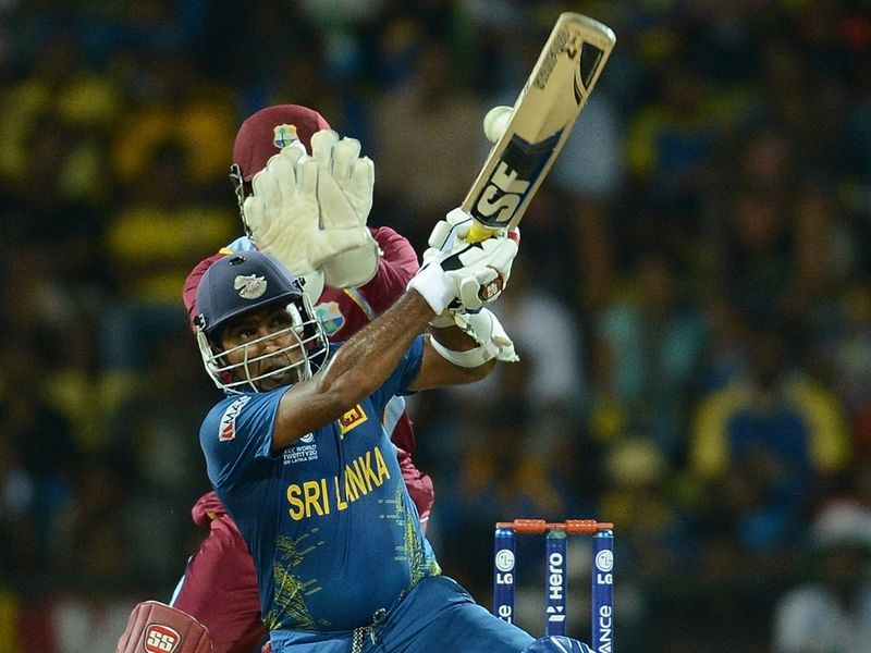 ...and the skipper reached his fifty while playing audacious scoop shots.