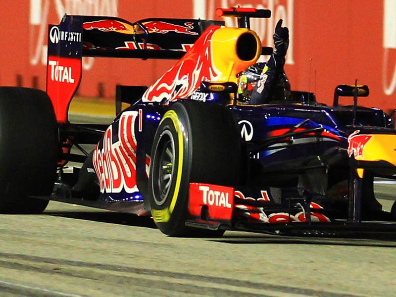 Vettel crosses the line to claim his victory