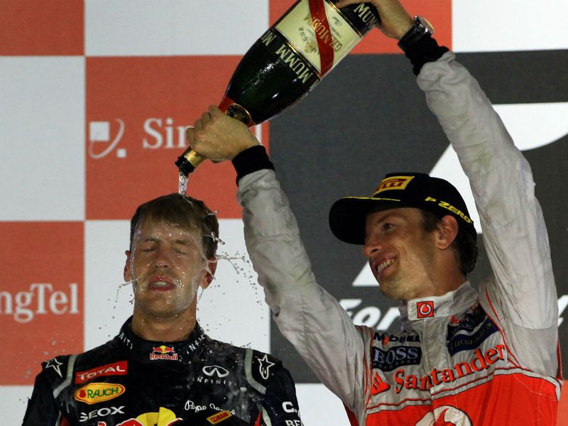 Button soaks Vettel