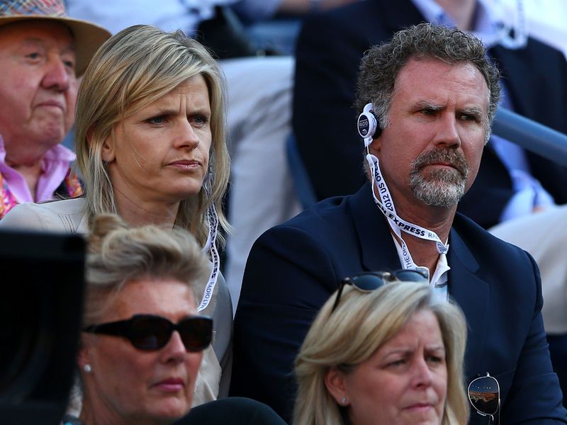 Actor Will Ferrell watches the action unfold with his wife Viveca Paulin