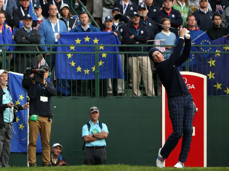 Furyk tees off for the hosts and (like McIlroy) fires it to the crowd's left.