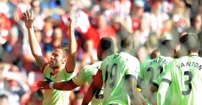 Newcastle celebrate after Yohan Cabaye gives them an early lead at their arch-rivals Sunderland