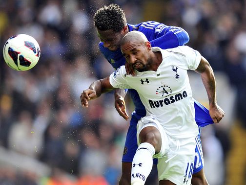 Mikel and Defoe in aerial battle