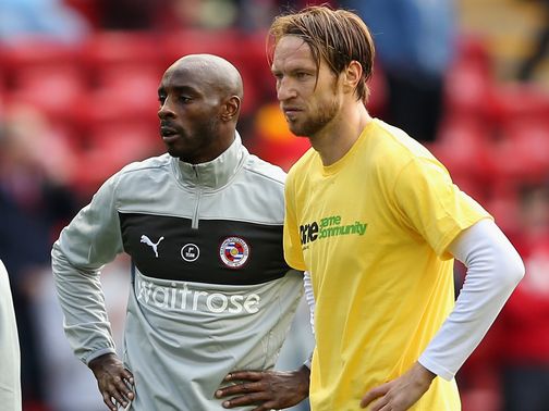 Roberts didn't wear a 'Kick It Out' T-shirt on Saturday