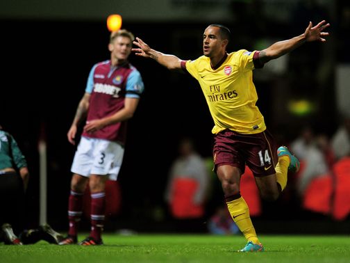 Theo Walcott: Warned that the club won't break their wage structure