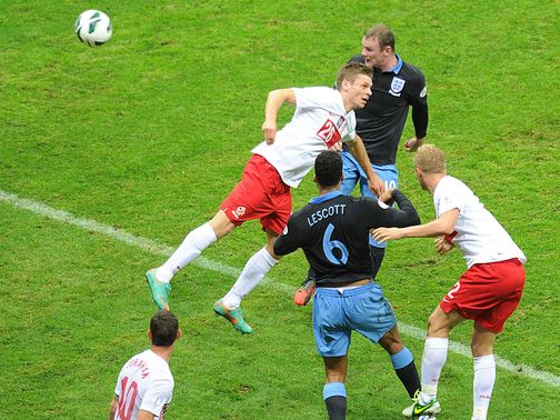 Wayne Rooney scores for England against Poland.