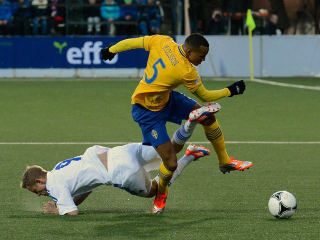 Martin Olsson moves away from Daniel Udsen.
