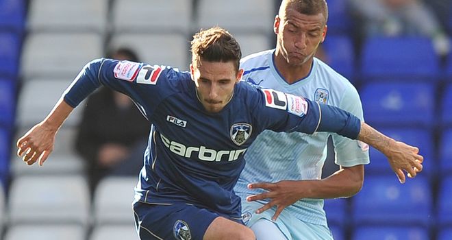 Matt Derbyshire: Will be staying at Oldham on loan, says manager Dickov