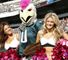 The Philadelphia Eagles mascot enjoys a photo with the cheerleaders.