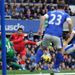 Luiz Suarez's deflected effort put Liverpool into the lead during the Merseyside derby against Everton