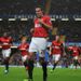 Robin van Persie celebrated after his shot came back off the post and ricocheted into the net off Chelsea defender David Luiz to put his side 1-0 up.